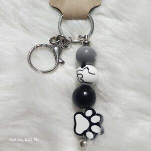 METAL KEYCHAIN WITH WOODEN BEADS THEMED WITH DOG PAW PRINTS
